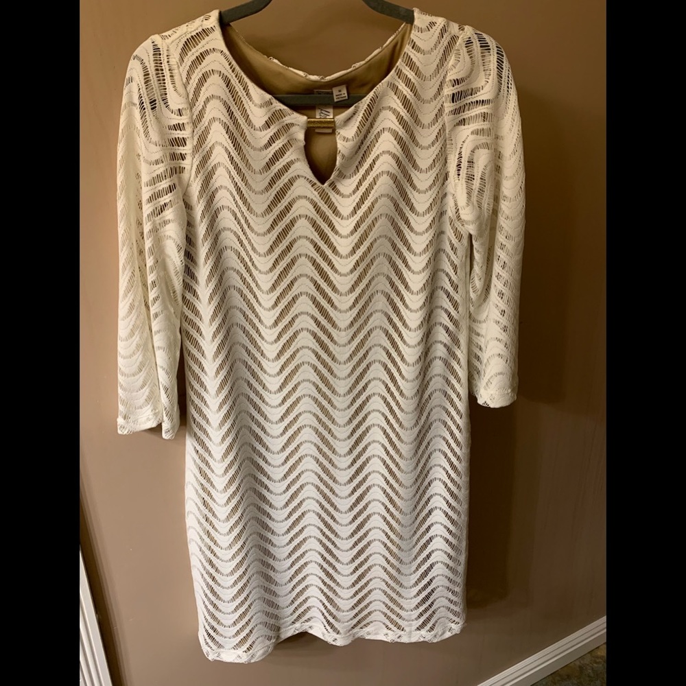 Cream colored crepe dress with tan lining